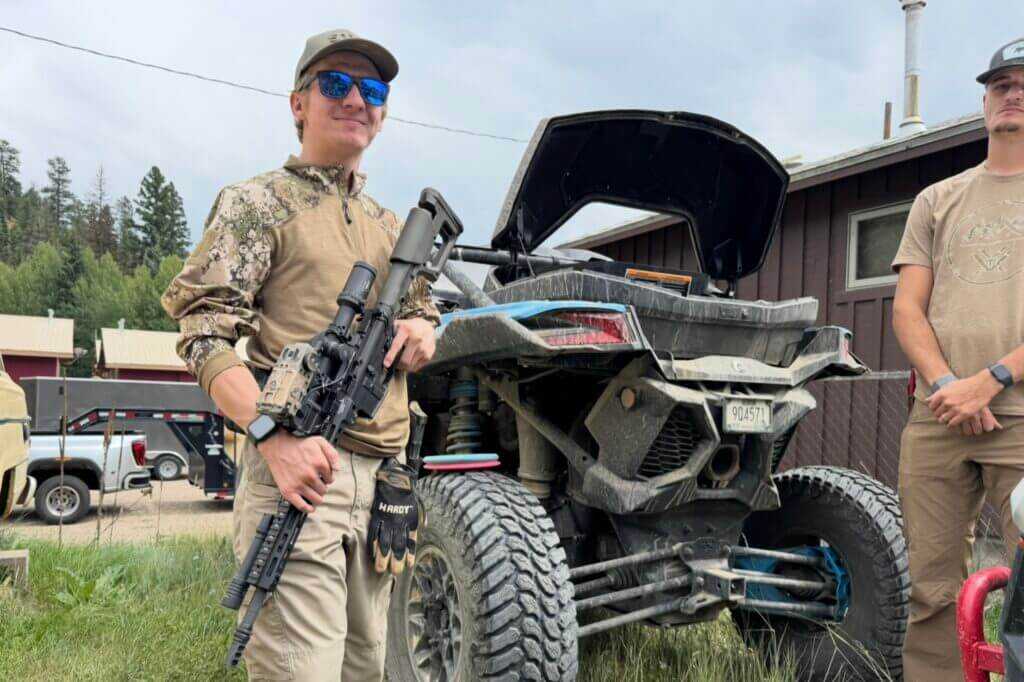 man with gun and 4wheeler. X4-FCS