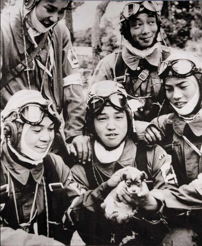 boys with a puppy. Adair
