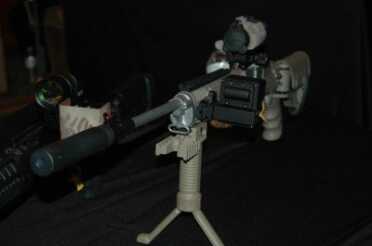 Here is an all-out accessorized Mini-14 with suppressor.