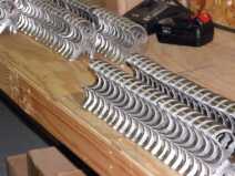 Machined and sanded frames awaiting the next operation.