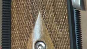 The aggressive checkering on the mainspring cover and front strap is perfection.