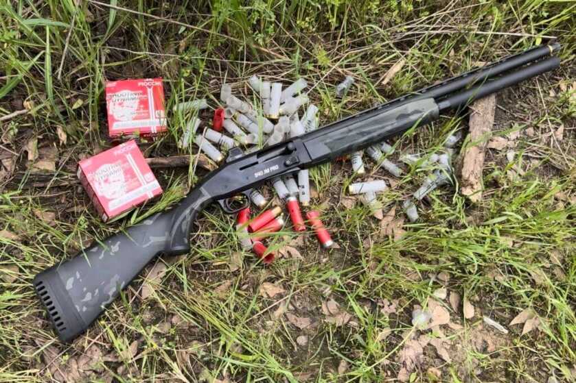 Mossberg 940 JM Pro Multicam optic-ready competition shotgun on range table