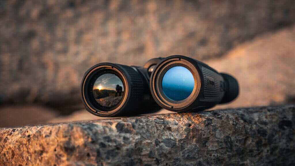 binoculars on a rock