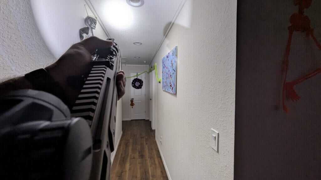 umbrella method weapon light pointed at ceiling to diffuse light