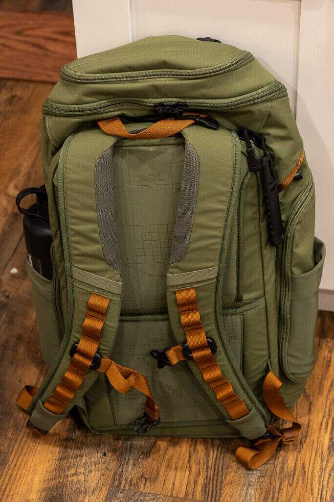 Vertx Gamut 32L front pocket open showing organizer layout