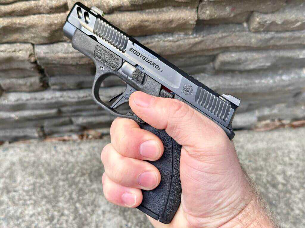 S&W Bodyguard 2.0 Carry Comp with 10 round flush magazine in hand, showing full grip purchase