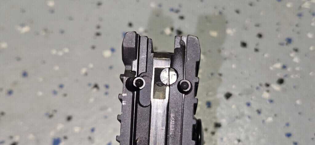 Bottom of Sig P211 GTO showing series 80 style safety plunger and Sig-Loc optic mounting footprint