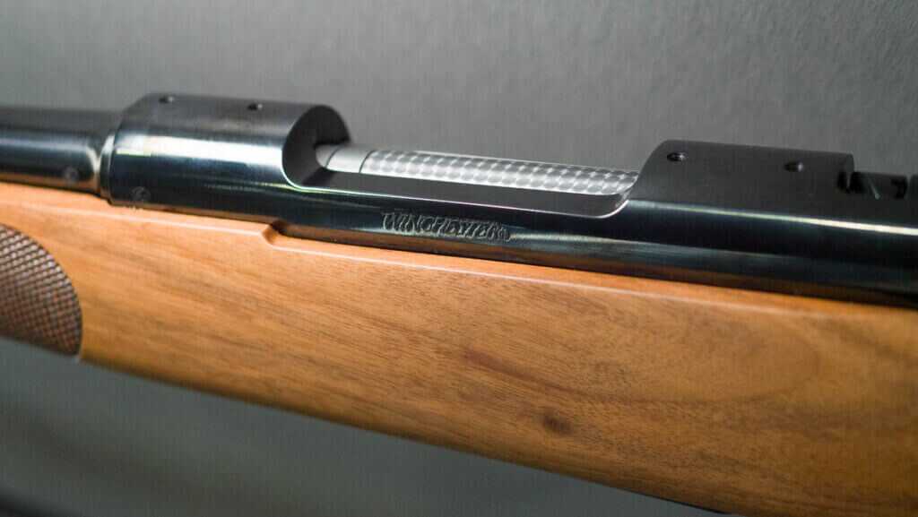 close up view of the left side of the bolt showing the makers mark.