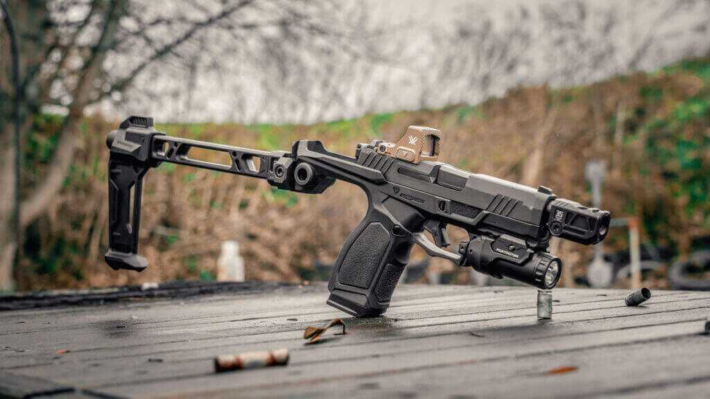 Taurus GX4 Strike Bravo braced setup with Strike Industries Micro Comp, Vortex Defender CCW, and SIG Foxtrot 2R EDC Light