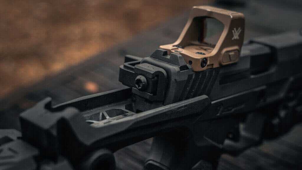 Rear metal sight and ambidextrous charging handle with Vortex Defender CCW on Taurus GX4 Strike Bravo