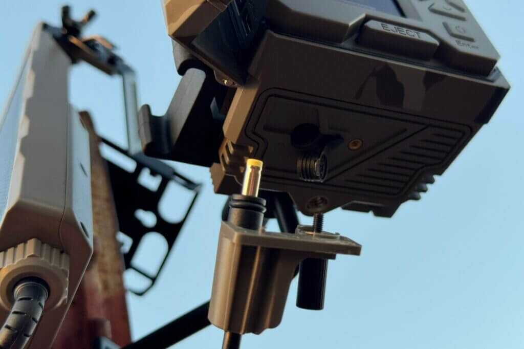 Weatherproof charging port connection on Tactacam REVEAL Ultra with secure screw-in fit