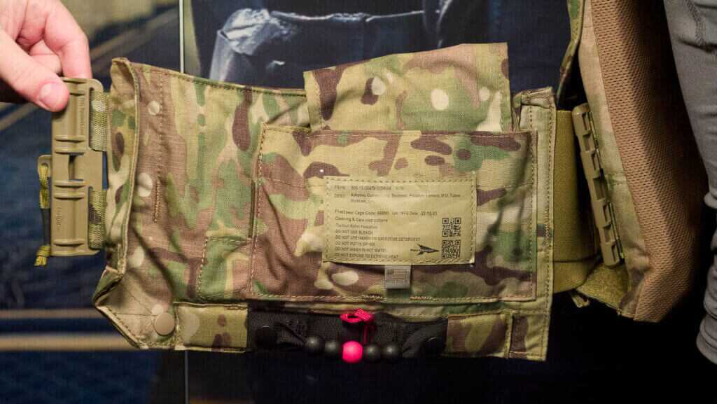 Close up view of the right hand cummerbund pulled open to show the emergency inflation device.