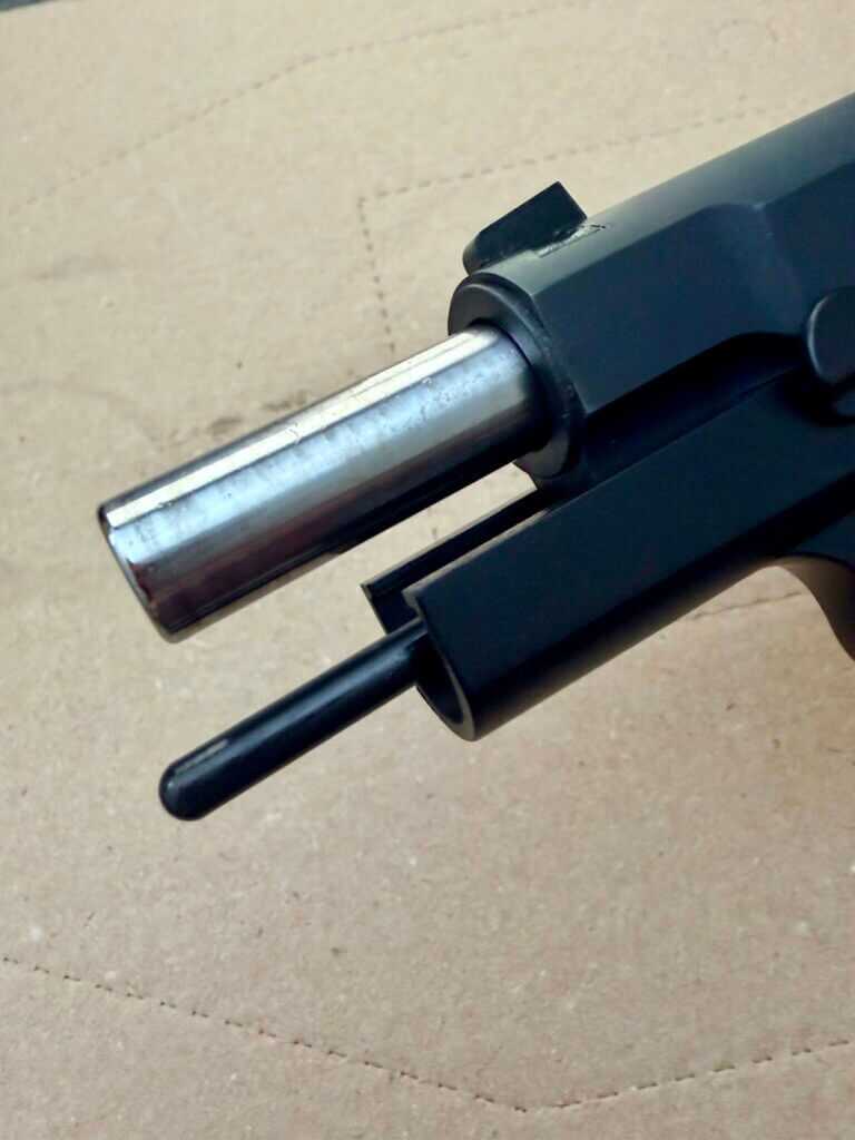 Springfield Armory SA-35 4-inch with slide locked open, revealing the full-length recoil spring guide inside the compact slide