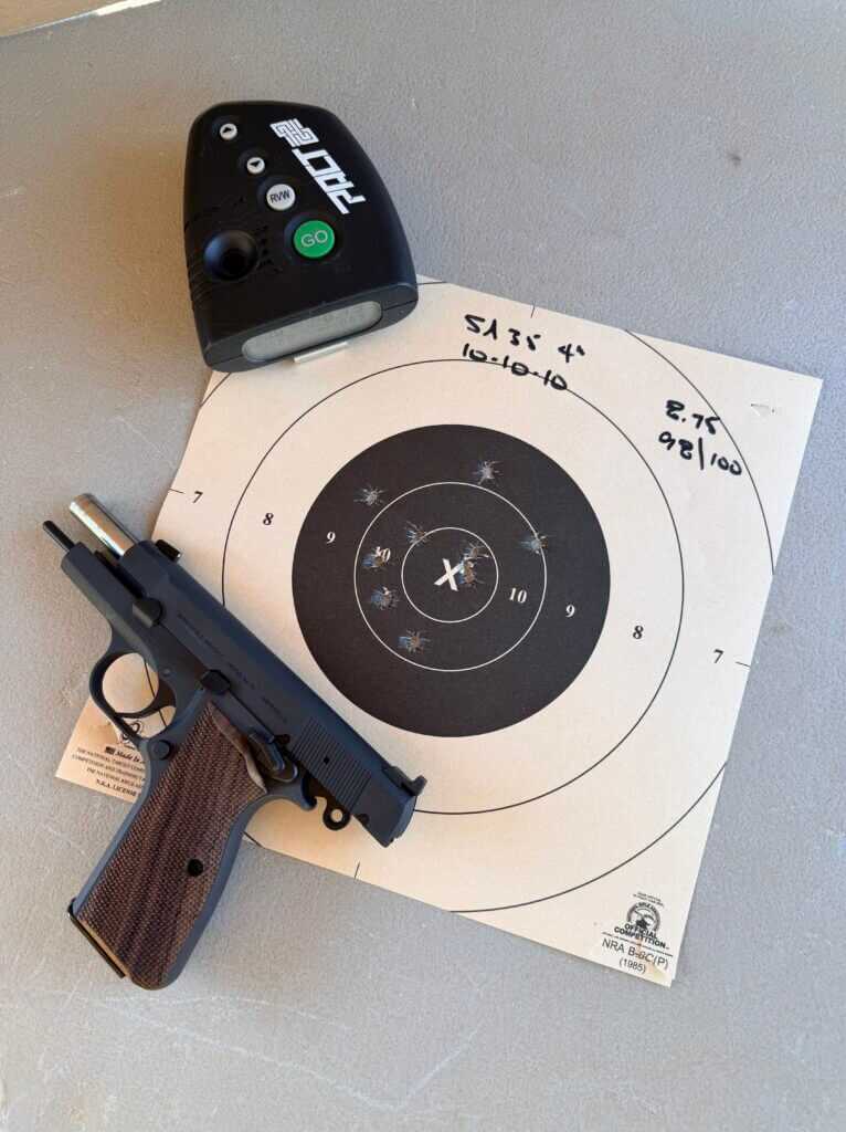 B8 target from the author’s 10-10-10 drill with the Springfield Armory SA-35 4-inch, scoring 98 out of 100 with 3 Xs
