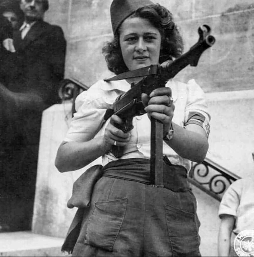 French Resistance woman armed with a compact pistol during World War 2 illustrating the value of arming irregular forces