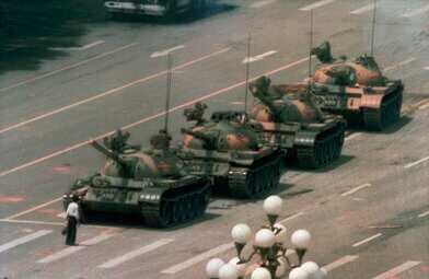 Tank Man at Tiananmen Square standing before Chinese tanks in iconic resistance image