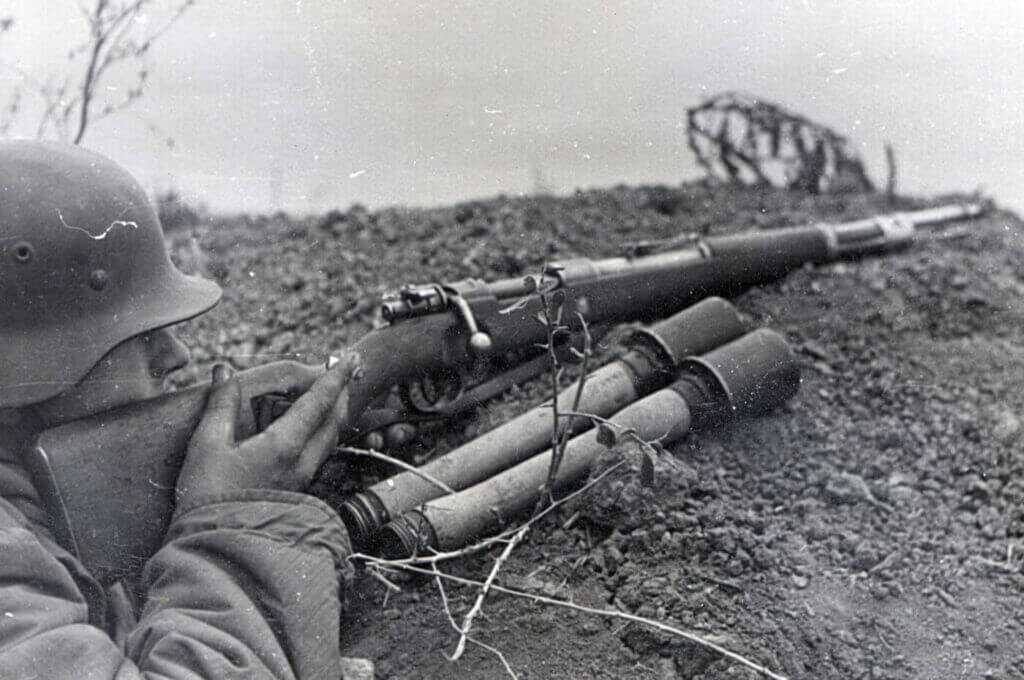 WWII German soldier carrying Mauser Karabiner 98k service rifle