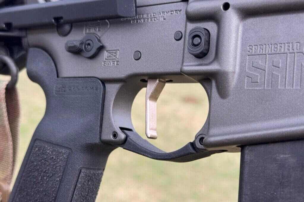 Flat-faced nickel boron trigger inside Springfield Armory SAINT Victor 9mm PDW lower receiver