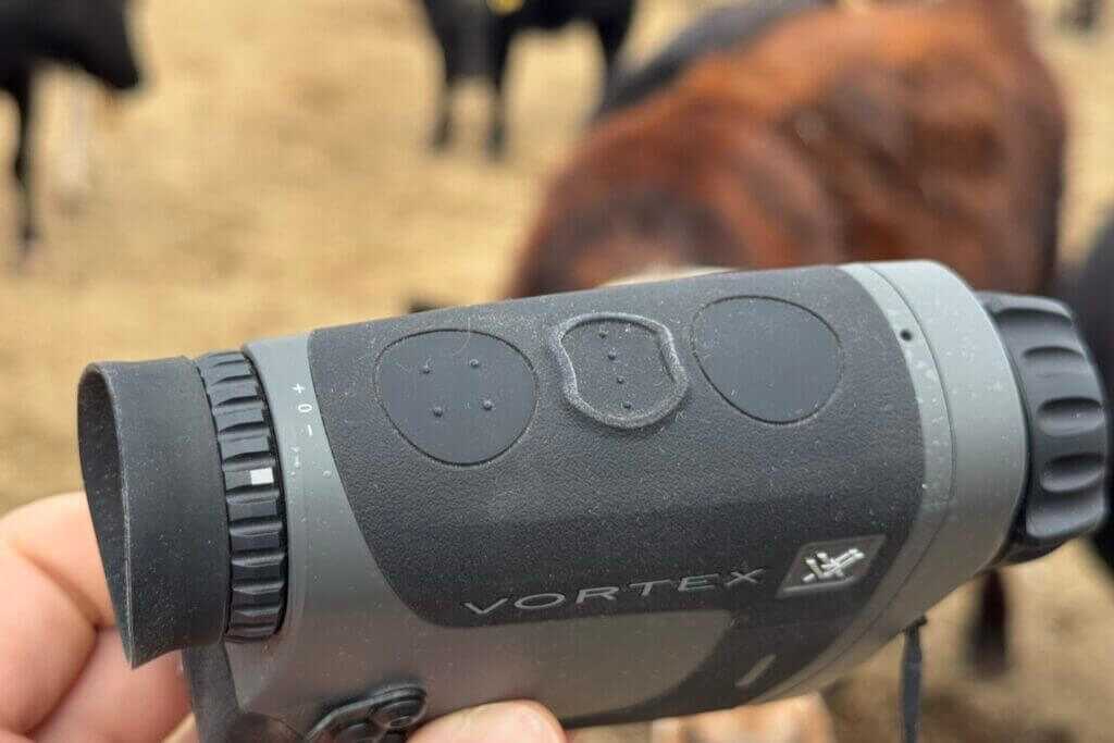 Three main control buttons on the Vortex Veil 400 thermal monocular used for brightness zoom menu and recording