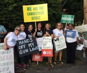 Activists who gathered in Connecticut over the weekend to protest Gov. Chris Christie's veto of a New Jersey bill that would have limited the state's magazine capacity to 10 rounds (Photo: Everytown)