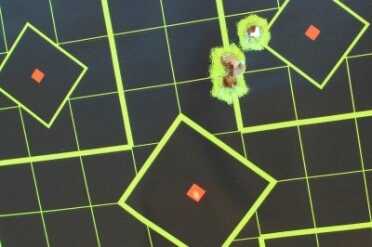 With the laser aimed here, shots hit high right, but close enough to be deadly.