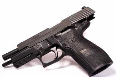 You can keep the safety engaged while manipulating the slide.