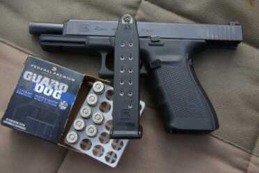 The magazine on these guns holds 13 rounds. 