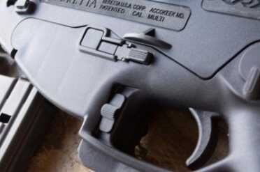 Note the magazine release button already present on the left side.