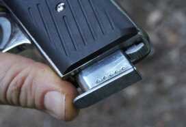 I find the bottom magazine release to be better for a gun you aren't going to carry extra mags for regardless. 