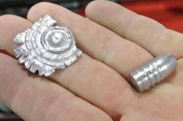 Some serious steal plate expansion. That is not a 100% lead bullet. They didn't know the exact % at the booth. 