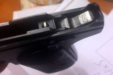 The hammer on the hammerless.  It is there but hidden under the slide.