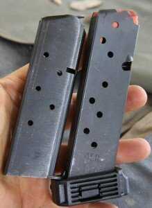 These mags may feel and look like 1911 mags, but they are slightly different, though I think it was stupid to use a proprietary design. 