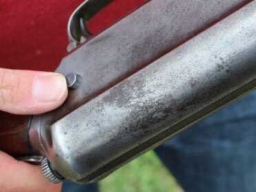 The button is used to lock the bolt open. 