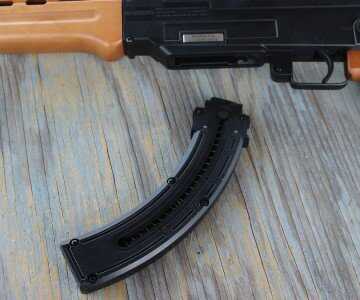 There's no paddle in front of the trigger guard for the release.