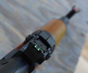 There's no real good option for mounting optics. The barrel, though, is tapped. In this configuration, though, the holes are buried beneath the hand-guard. 