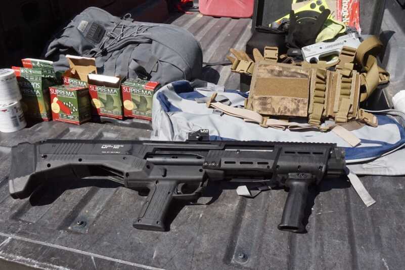 The DP-12 is an ammo hog. The Best way I could find to feed it was the SOE Gear Micro Cop Rig (upper right). The rig keeps extra ammo front and center.