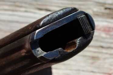 This one has the magazine catch on the bottom one clue that this is a 1st series pistol. 