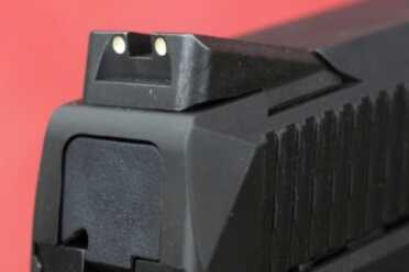 The rear sight. 