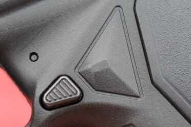 This diamond points to the mag release, making mag changes easy.