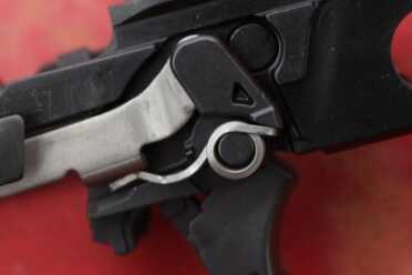 This spring pops off easily. When it falls in the grass, it is hard to find. 