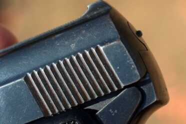 Note the pin in the cocked position.