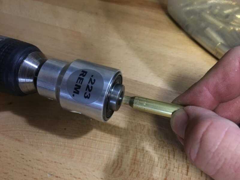 The Little Crow WFT attaches to a power drill. Just insert the case like this to trim.