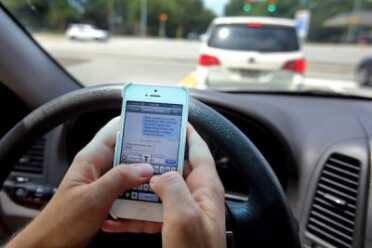 (Photo: Post And Courier) Domestic Abuser by way of texting while driving.