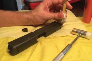 The front sight slid in easily using the hammer and brass punch. 