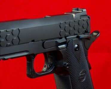 The recessed slide stop lever was one of the author's favorite elements. The seamless marriage of polymer and steel is signature STI.