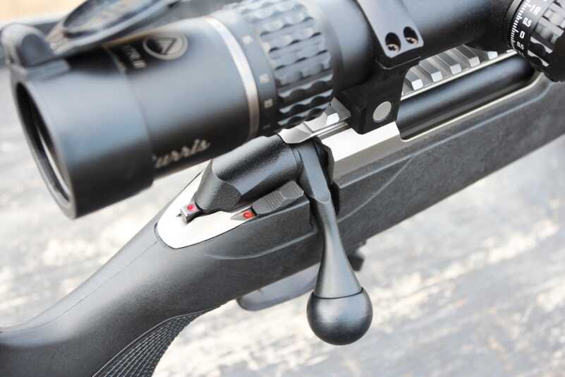 The two-position safety will lock the bolt down in the "safe" position. 