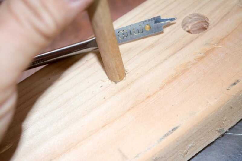 We're going to use a weird analogy to illustrate what crimping does and does not do. It's kind of like inserting a wooden dowel into a hole drilled in a block of wood. 