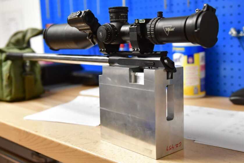 Aluminum bedding block for testing actions.