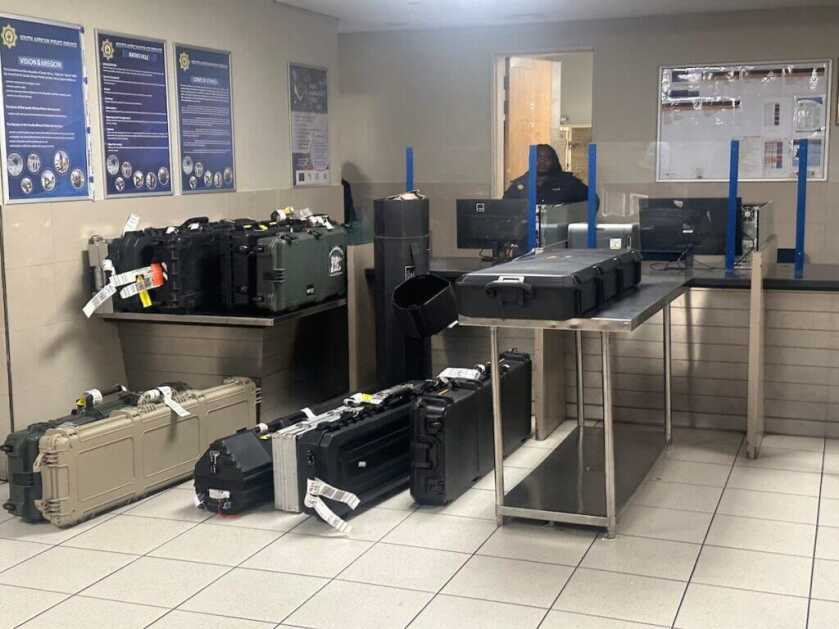 TSA with big gun cases