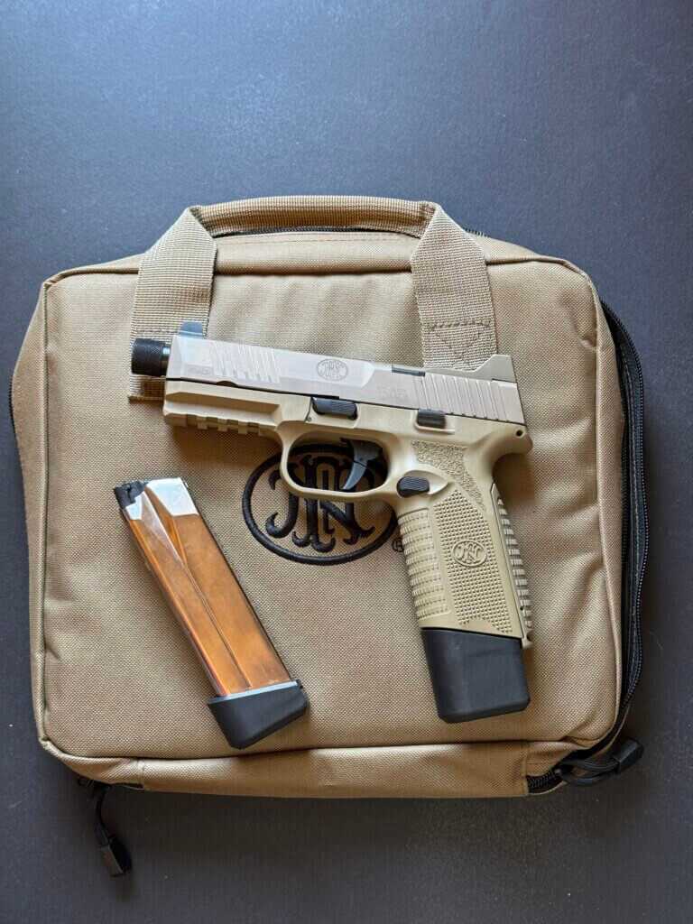 The FN 545 Tactical with a magazine and a nylon case